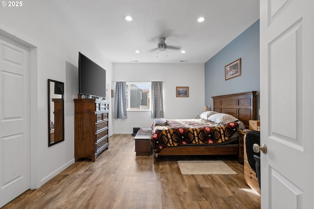 bedroom with light wood-style flooring, baseboards, ceiling fan, and recessed lighting