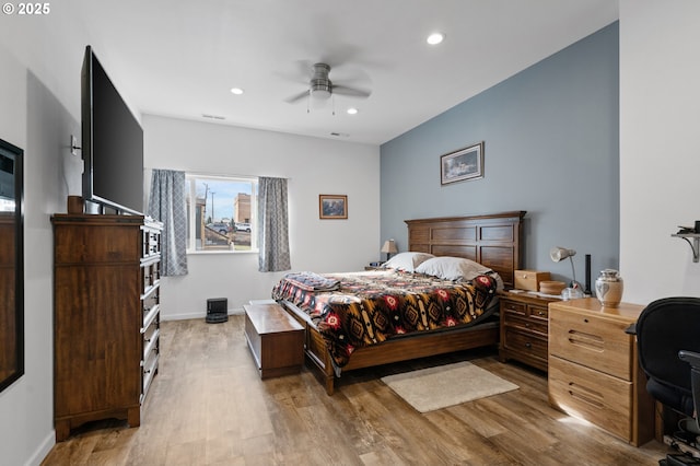 bedroom with recessed lighting, visible vents, a ceiling fan, light wood-type flooring, and baseboards