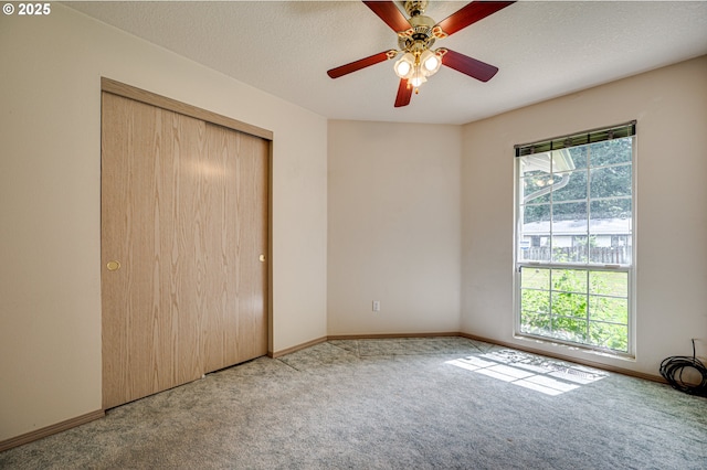 9120 NE 54th St, Vancouver, WA 98662 - unfurnished bedroom featuring carpet floors, a closet, a ceiling fan, and a textured ceiling