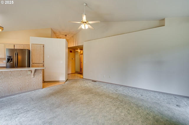 9120 NE 54th St, Vancouver, WA 98662 - unfurnished living room with light colored carpet, vaulted ceiling, and ceiling fan