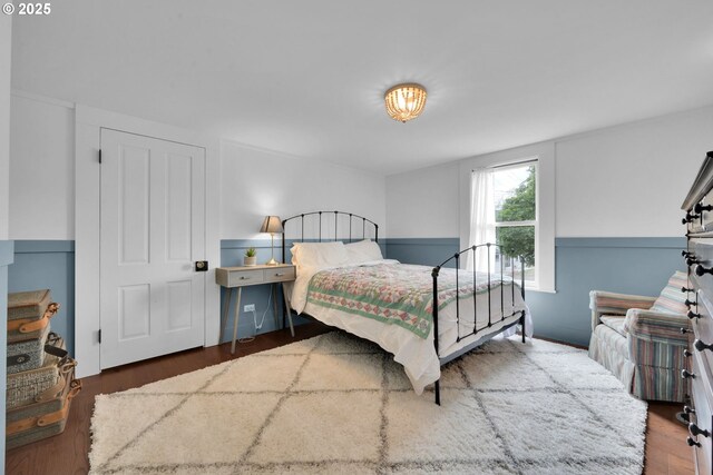 bedroom with wood finished floors