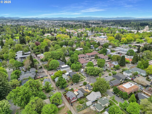 birds eye view of property featuring a residential view and a mountain view