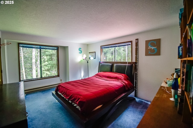 carpeted bedroom featuring a textured ceiling and baseboard heating