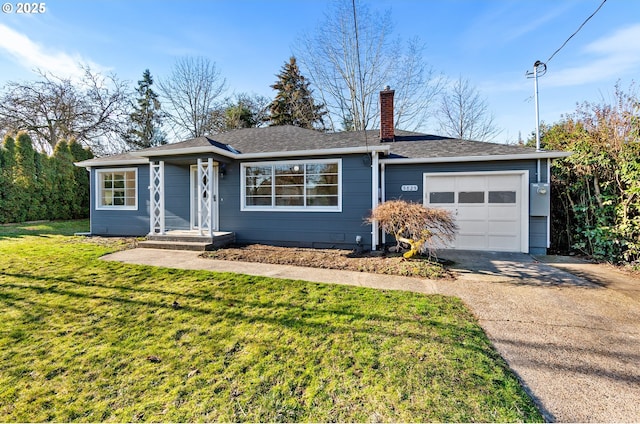 single story home with a front yard and a garage