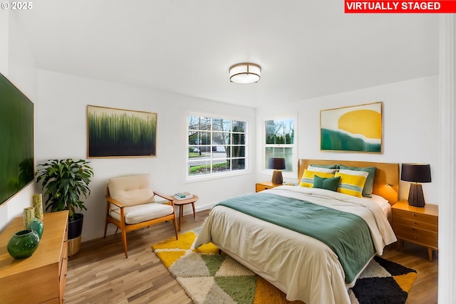 bedroom featuring wood-type flooring