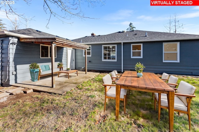 rear view of property with a patio