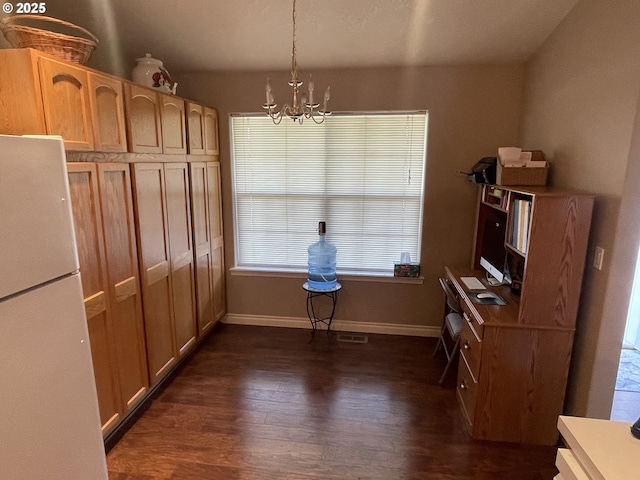 dining area featuring a chandelier, baseboards, visible vents, and dark wood finished floors
