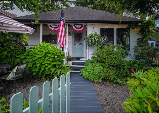 762 G St, Gearhart, OR 97138 - view of front of house with a shingled roof