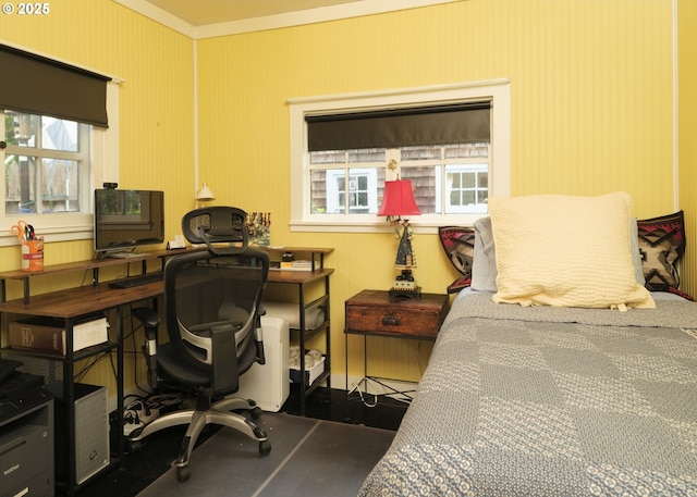 762 G St, Gearhart, OR 97138 - bedroom with multiple windows, ornamental molding, and an office area