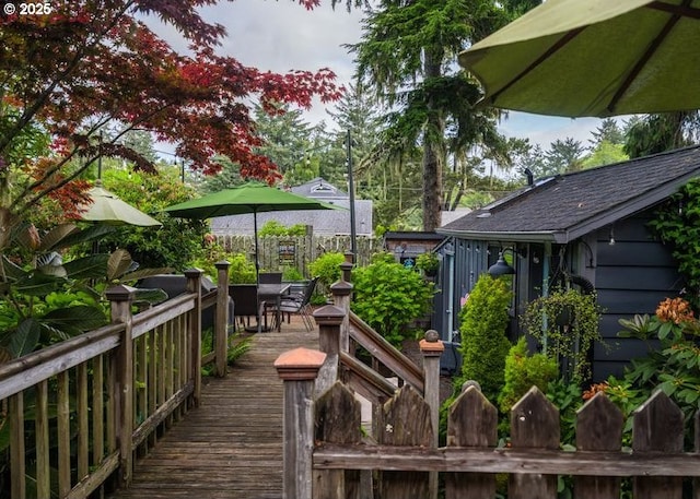 762 G St, Gearhart, OR 97138 - wooden terrace featuring outdoor dining space