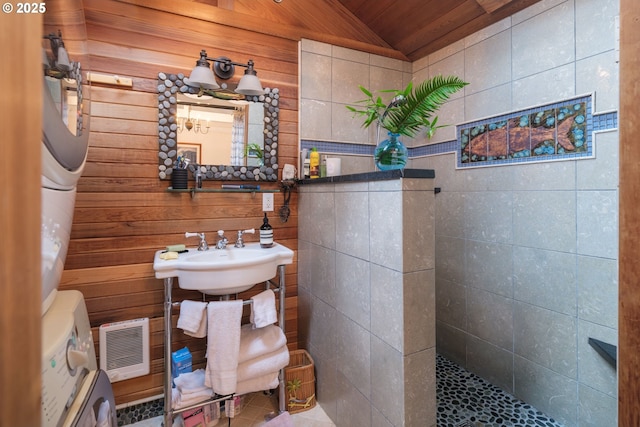 762 G St, Gearhart, OR 97138 - full bathroom featuring walk in shower, vaulted ceiling, wood walls, wood ceiling, and heating unit