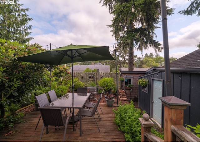 762 G St, Gearhart, OR 97138 - wooden deck featuring outdoor dining space