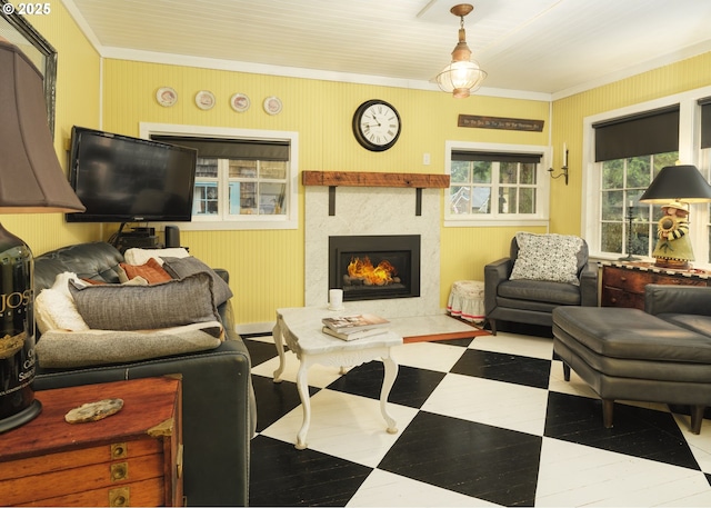 762 G St, Gearhart, OR 97138 - living area featuring a tile fireplace and ornamental molding