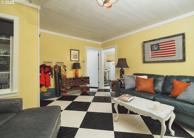 762 G St, Gearhart, OR 97138 - living room featuring ornamental molding and tile patterned floors