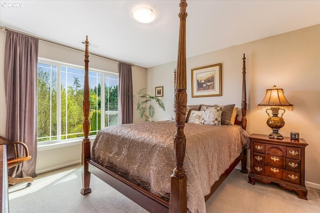 5711 SE Vista Ct, Milwaukie, OR 97267 - carpeted bedroom with multiple windows and baseboards