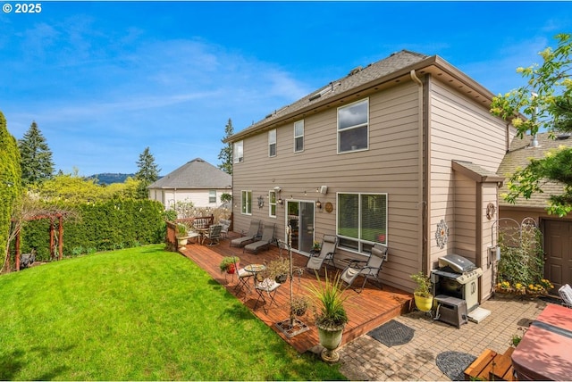 5711 SE Vista Ct, Milwaukie, OR 97267 - back of house with a wooden deck, a lawn, and an outdoor hangout area
