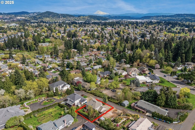 5711 SE Vista Ct, Milwaukie, OR 97267 - aerial perspective of suburban area with property boundaries highlighted and a mountain backdrop