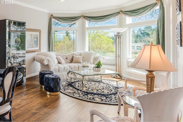 5711 SE Vista Ct, Milwaukie, OR 97267 - living area featuring crown molding, healthy amount of natural light, wood finished floors, and baseboards