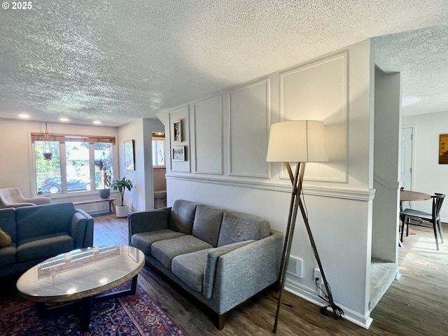 3851 Edgewood Dr, North Bend, OR 97459 - living room featuring a textured ceiling and wood finished floors