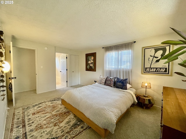 3851 Edgewood Dr, North Bend, OR 97459 - carpeted bedroom featuring a textured ceiling and ensuite bathroom