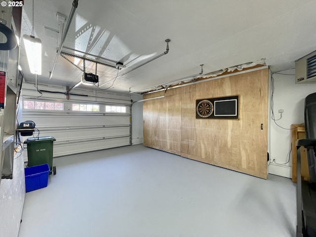 3851 Edgewood Dr, North Bend, OR 97459 - garage featuring wood walls and a garage door opener