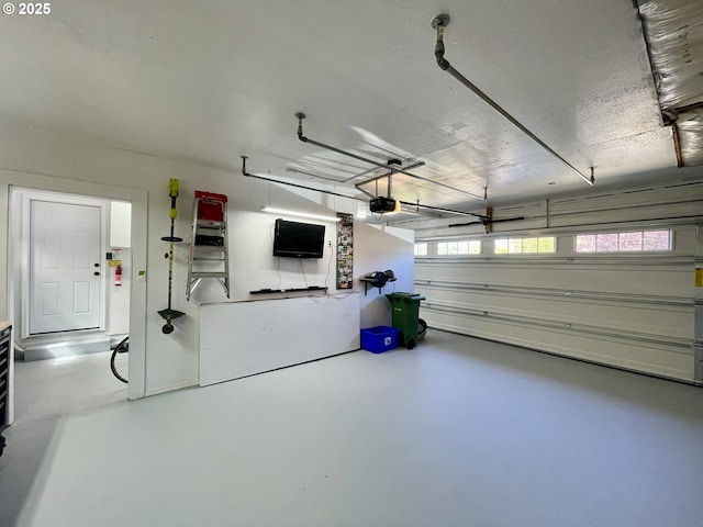 3851 Edgewood Dr, North Bend, OR 97459 - garage featuring a garage door opener