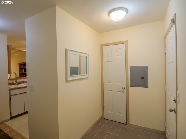 5142 SW Multnomah Blvd Unit A, Portland, OR 97219 - hallway with electric panel and a sink