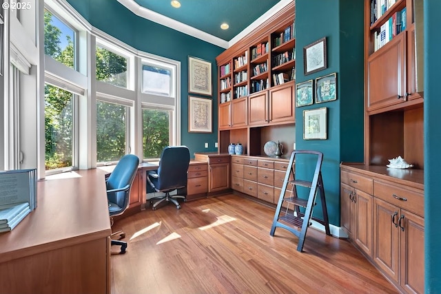 4055 NW Twilight Ter, Portland, OR 97229 - office space featuring light wood-type flooring, built in desk, built in features, recessed lighting, and ornamental molding