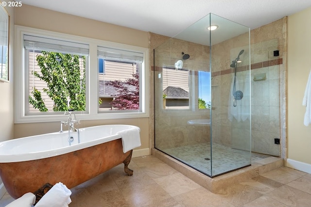 4055 NW Twilight Ter, Portland, OR 97229 - bathroom with a shower stall, a soaking tub, baseboards, and tile patterned floors