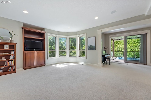 4055 NW Twilight Ter, Portland, OR 97229 - living room with recessed lighting, carpet floors, and baseboards