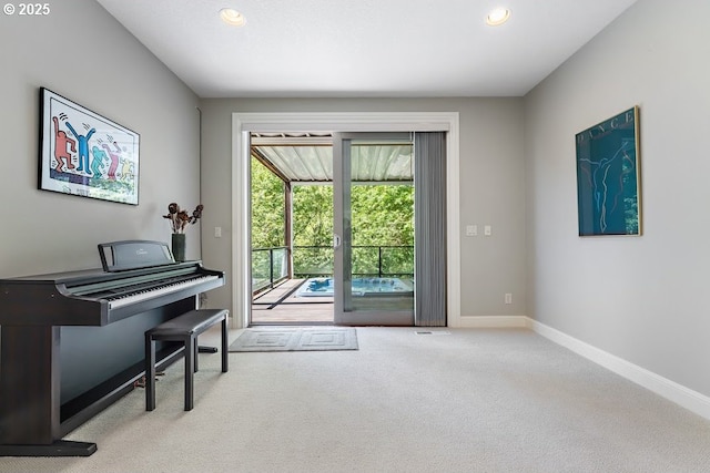 4055 NW Twilight Ter, Portland, OR 97229 - living area featuring carpet floors, baseboards, and recessed lighting
