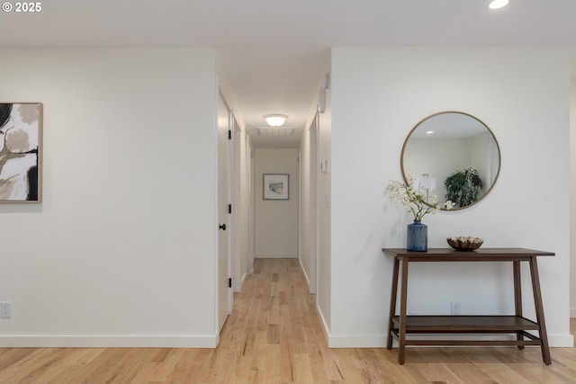 hallway featuring light wood-type flooring