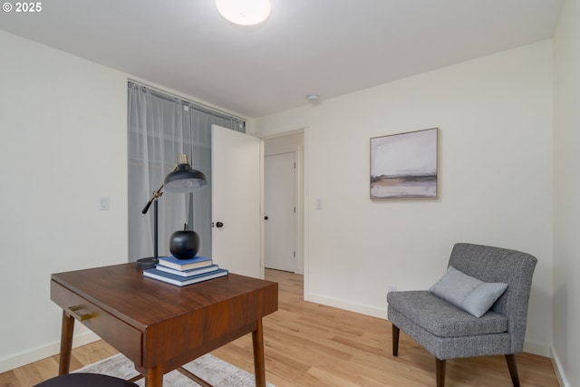 office area with light wood-type flooring