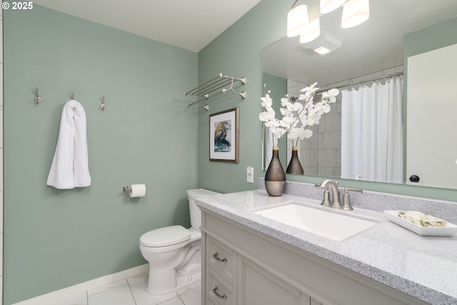 bathroom with vanity, toilet, and walk in shower