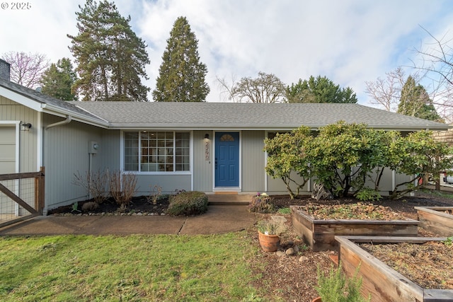 ranch-style house with a front lawn