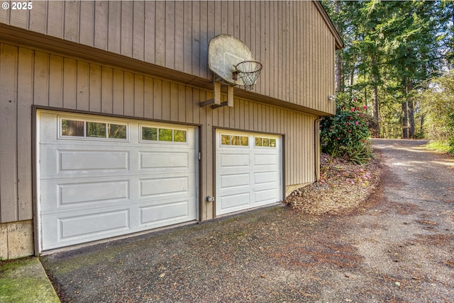 garage featuring driveway