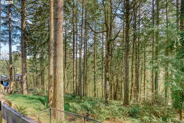 view of local wilderness with a view of trees