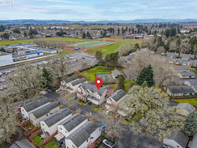 bird's eye view featuring a residential view and a mountain view