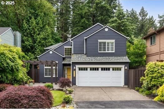 5364 Rosewood St, Lake Oswego, OR 97035 - traditional-style house featuring a garage, concrete driveway, and a pergola