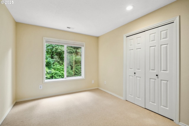 5364 Rosewood St, Lake Oswego, OR 97035 - unfurnished bedroom featuring carpet, baseboards, recessed lighting, and a closet