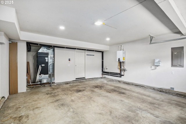 5364 Rosewood St, Lake Oswego, OR 97035 - garage with electric panel, tankless water heater, heating unit, and recessed lighting