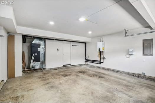 5364 Rosewood St, Lake Oswego, OR 97035 - garage with recessed lighting, water heater, and electric panel