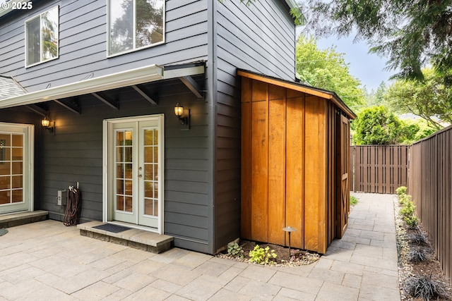 5364 Rosewood St, Lake Oswego, OR 97035 - fenced backyard featuring french doors and a patio area