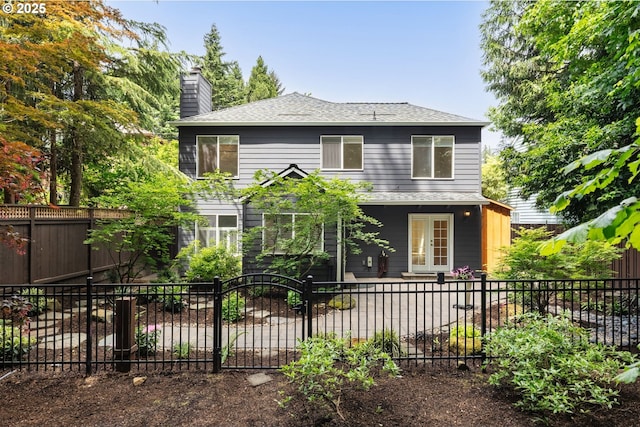 5364 Rosewood St, Lake Oswego, OR 97035 - back of house featuring roof with shingles and a chimney