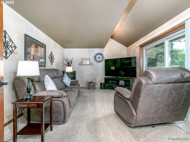 living room featuring carpet floors, a textured ceiling, and vaulted ceiling