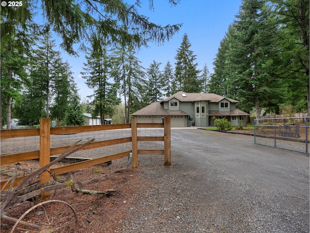 exterior space featuring fence and driveway