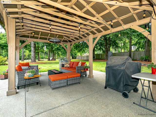 view of patio / terrace featuring a gazebo, an outdoor living space, a grill, and fence