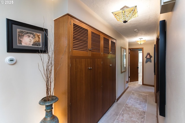 5339 SE Chase Rd, Gresham, OR 97080 - hallway featuring a textured ceiling and light colored carpet