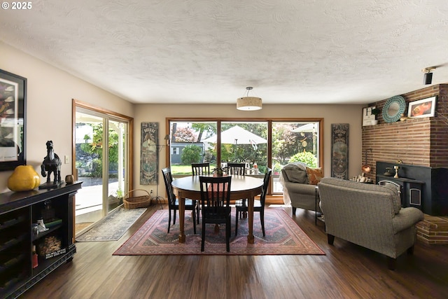 5339 SE Chase Rd, Gresham, OR 97080 - dining space with a textured ceiling and wood finished floors