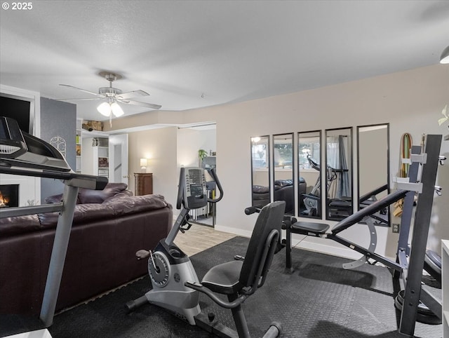 interior space featuring a textured ceiling and ceiling fan